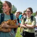 Girl holding a chicken