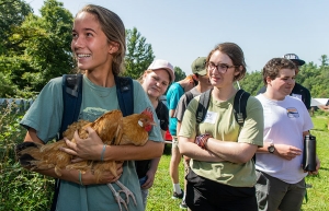 Girl holding a chicken